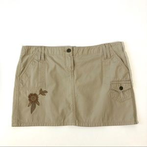 Sleek Tan Micro Mini Skirt With Floral Appliqué